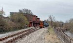 WE 6353 passes the 1875 A&GW depot.